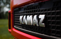 Фото логотипа (эмблемы, знака, фирменной надписи) грузовых автомобилей марки KAMAZ «КАМАЗ»