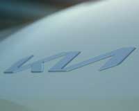 Фото логотипа (эмблемы, знака, фирменной надписи) грузовых автомобилей марки Kia «Киа»