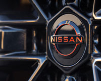 Фото логотипа (эмблемы, знака, фирменной надписи) легковых автомобилей марки Nissan «Ниссан»