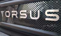 Фото логотипа (эмблемы, знака, фирменной надписи) автобусов марки Torsus «Торсус»